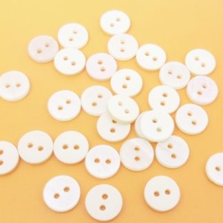 100 כפתורי פלסטיק דמוי צדף, קרם, 13ממ